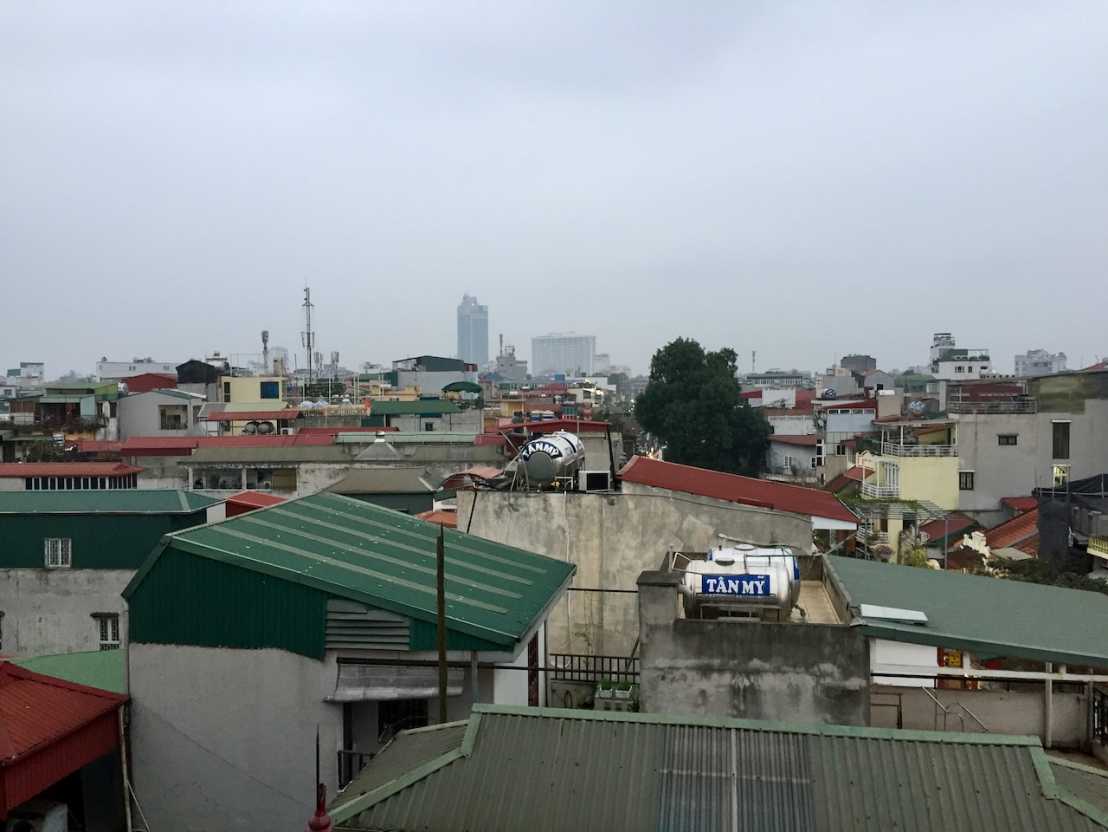 View over the rooftops of Hanoi with typical water tanks
